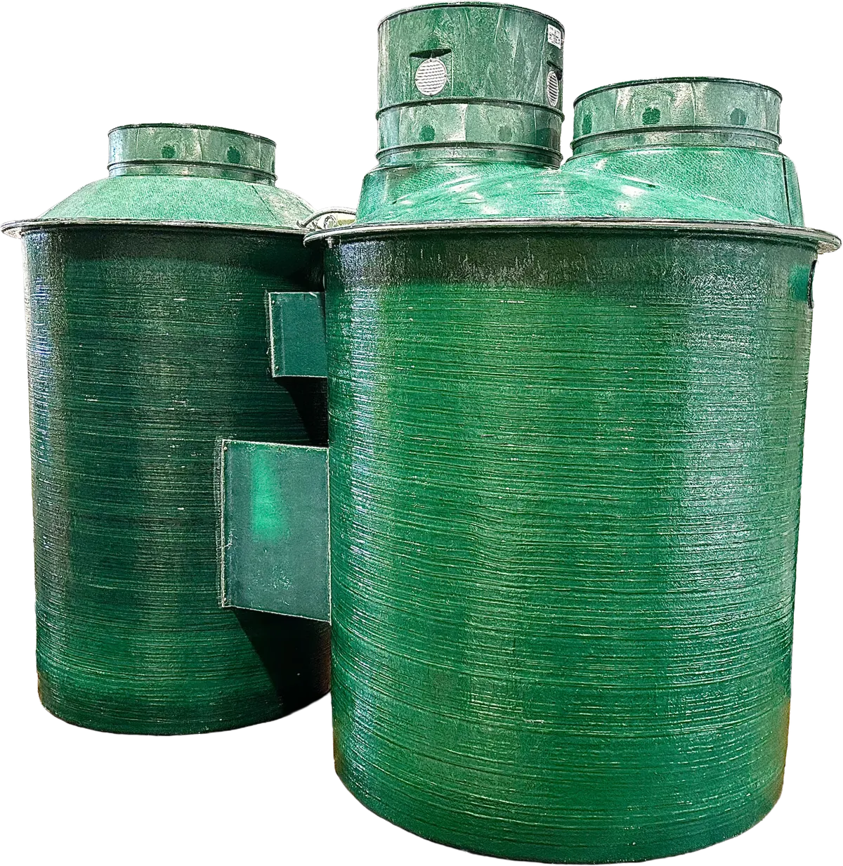 Two finished treatment tanks with risers and lids fitted, assembled and ready to ship